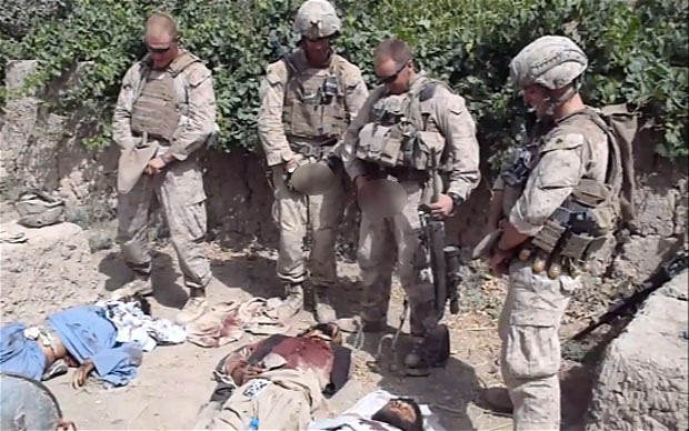 Marines Pissing on Corpses